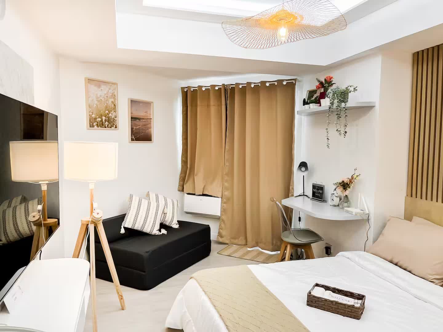 Living area with sofa and workspace